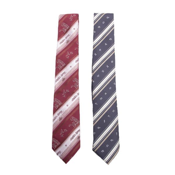 A men's formal jacquard necktie set featuring a maroon tie with patterns and a navy tie with stripes. Both have logos. Mens Formal Jacquard Necktie - Image 1