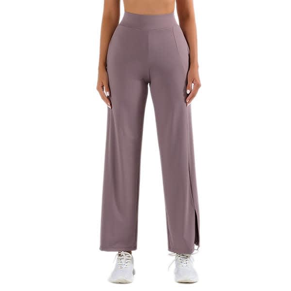 Flare wide leg yoga pants in a mauve shade, featuring slits on the sides, with a high waistband and pockets. Women Slit Flare Wide Leg Yoga Pants - Image 1