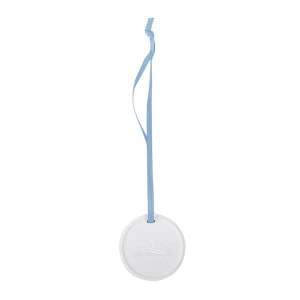 A round ceramic aroma diffuser stone in white, hanging from a light blue ribbon. Round Hanging Ceramic Aroma Diffuser Stone - Image 1