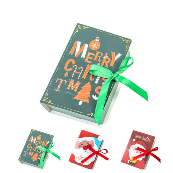 A decorative gift box in green with a ribbon, featuring a festive design for Christmas. Creative Book Shape Candy Gift Box - Image 1