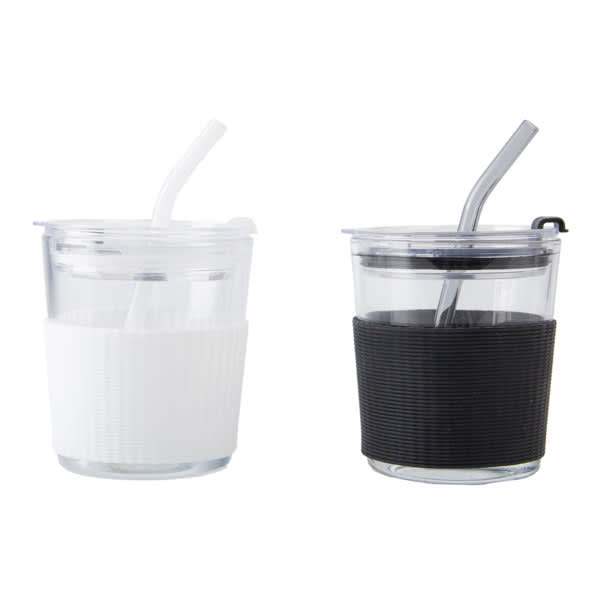 A drink bottle set featuring a white and a black glass coffee cup, each with a lid and straw, and ribbed silicone sleeves. Glass Coffee Cup With Lid And Straw - Image 1