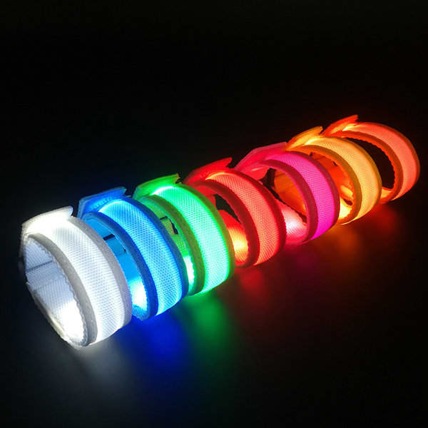 A set of adjustable nylon LED bracelets in various colours, including white, green, blue, red, and orange. Adjustable Nylon LED Bracelet - Image 1