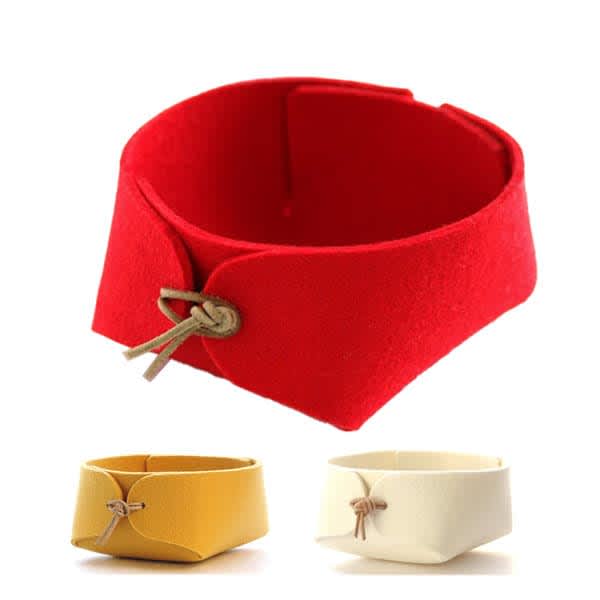 A red felt desktop organiser with two smaller containers in yellow and white, featuring a leather tie detail. Custom Felt Desktop Organizer - Image 1