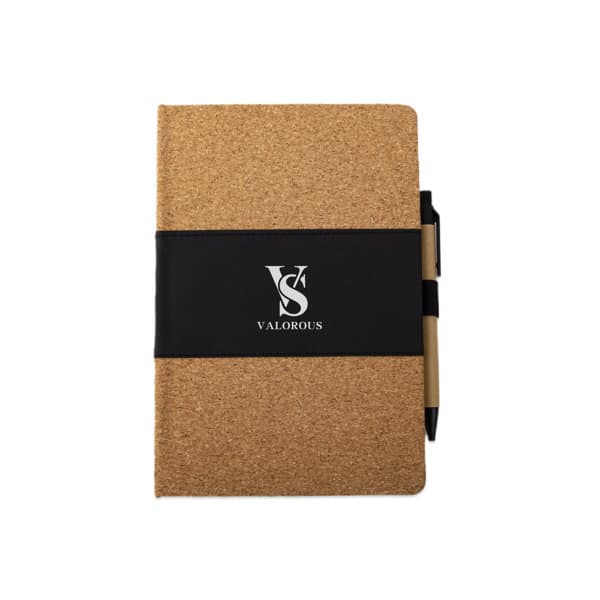 A cork A5 notebook featuring a black band and a pen holder, with a logo on the front. Eco Friendly A5 Cork Notebook With Pen Holder - Image 1