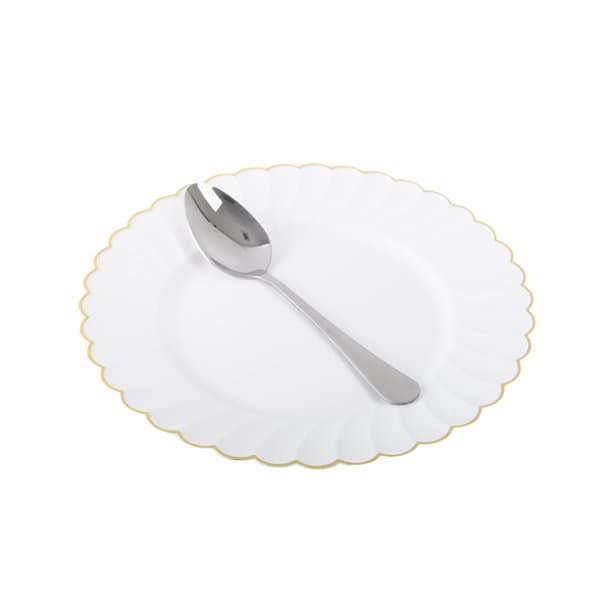 A stainless steel dinner spoon rests on a white plate with a gold scalloped edge. The spoon has a sleek, polished finish. Stainless Steel Dinner Spoon - Image 1