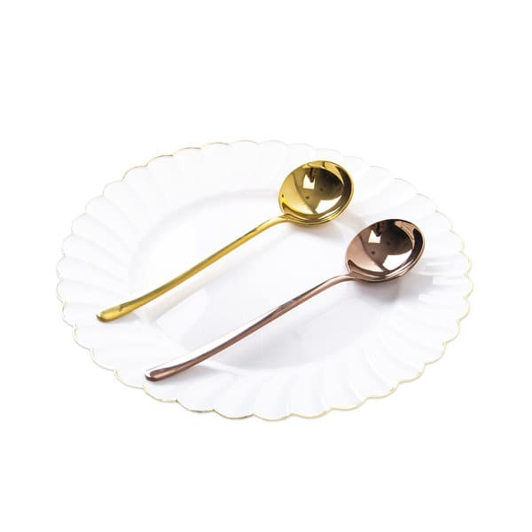 A white plate holds a stainless steel golden round spoon and a rose gold spoon, both showcasing a polished finish. Stainless Steel Golden Round Spoon - Image 1