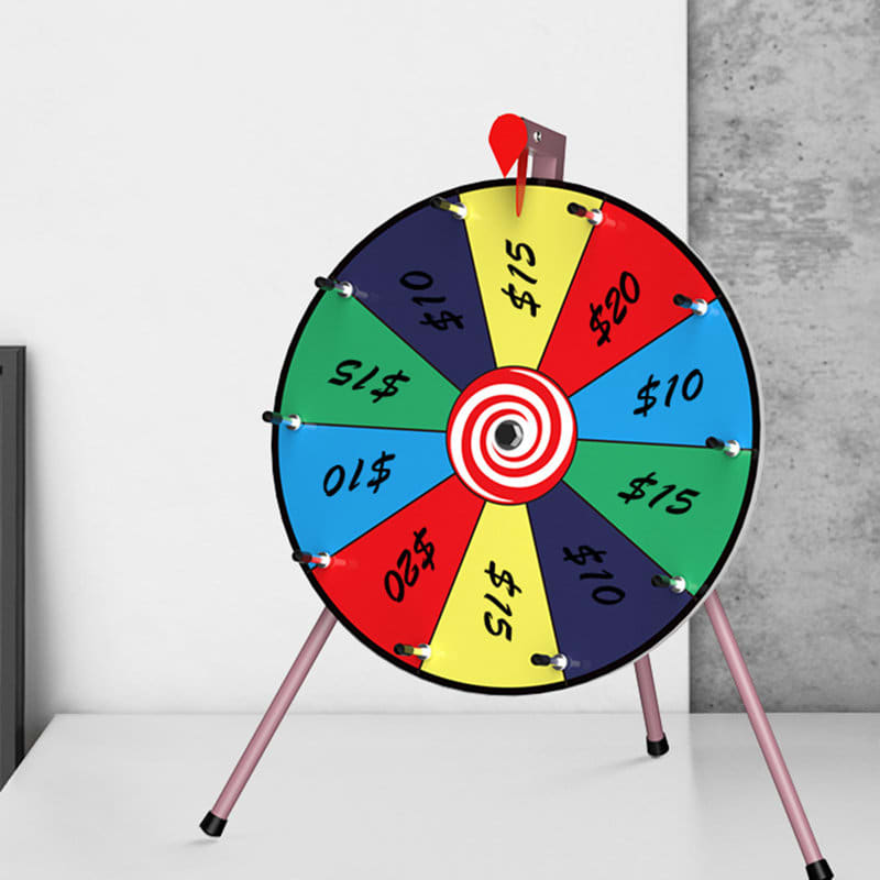 A colourful tabletop spinner wheel with segments in red, blue, yellow, and green, featuring various dollar amounts. Tabletop Spinner Wheel - Image 1