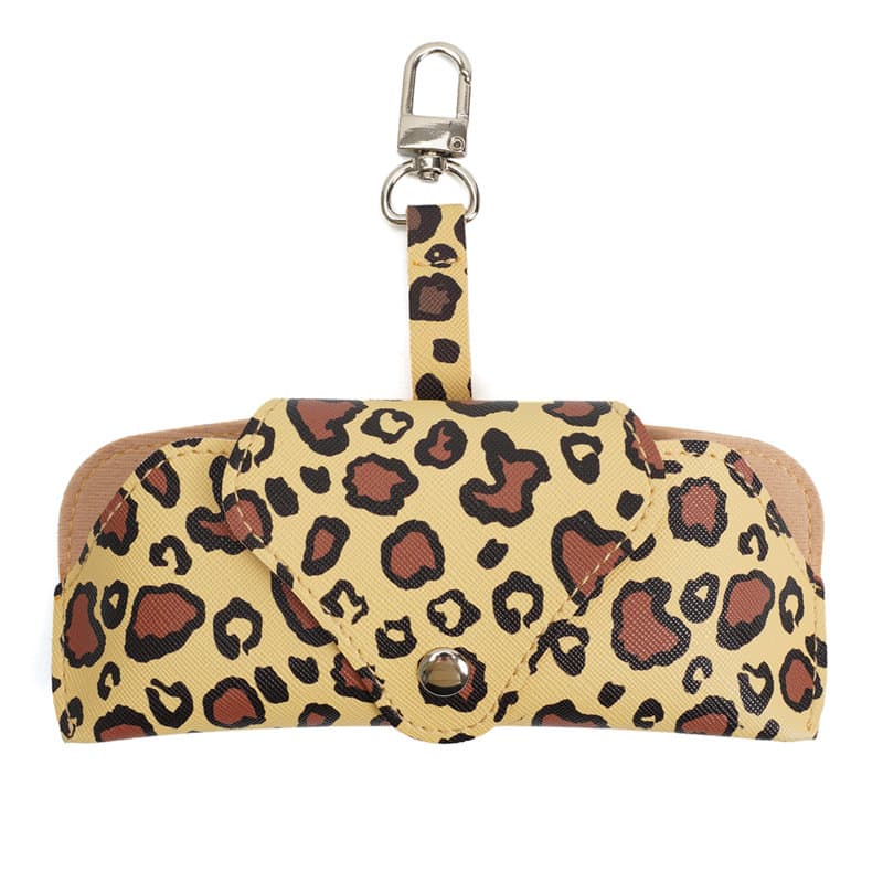 A portable glasses pouch in yellow with a leopard print design, featuring a carabiner for easy attachment. Portable Glasses Pouch With Carabiner - Image 1