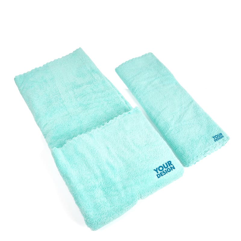 A set of two coral fleece bathroom towels in a mint green colour, featuring a logo. 2Pcs Coral Fleece Bathroom Towel Set - Image 1