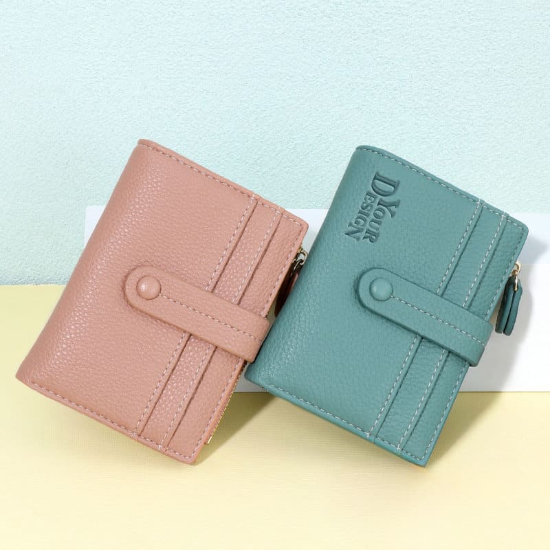 A lychee-pattern multi-card wallet featuring a pink and a green design, both with a logo and button closure. Lychee Pattern Multi-card Wallet - Image 1
