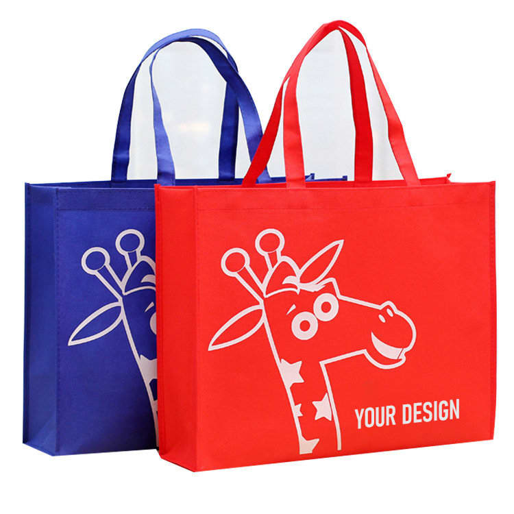 Two reusable non-woven grocery bags in blue and red, featuring a giraffe design and logo. Non Woven Grocery Bag - Image 1
