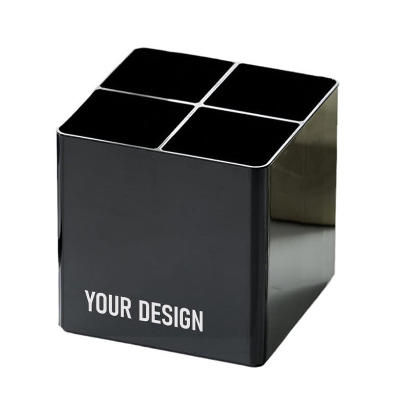 A black makeup brush holder organiser with a glossy finish and four compartments for storage. Makeup Brush Holder Organizer - Image 1