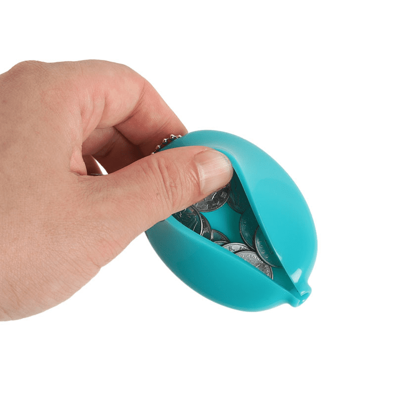 A hand holding a turquoise PVC squeeze oval coin purse filled with coins, showcasing its soft, flexible design. PVC Squeeze Oval Coin Purse - Image 1