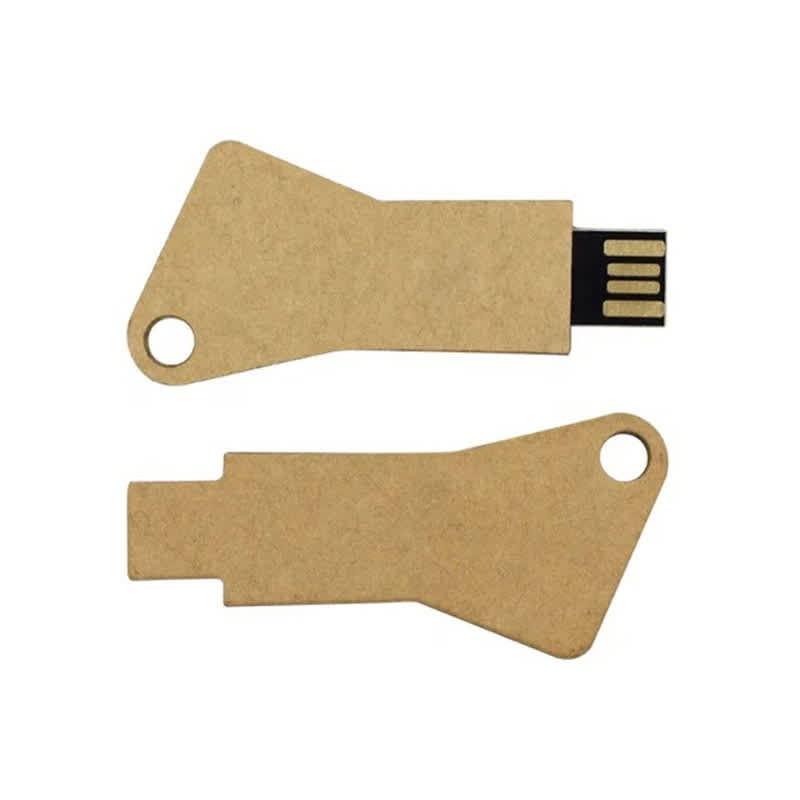 A biodegradable USB flash drive in a tan colour, featuring a unique key-like design and a logo. 4GB Biodegradable USB Flash Drive - Image 1