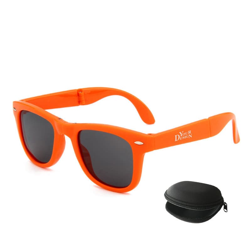 A pair of vibrant orange foldable sunglasses with grey lenses and a black protective case. Colorful Foldable Promotional Sunglasses Set - Image 1