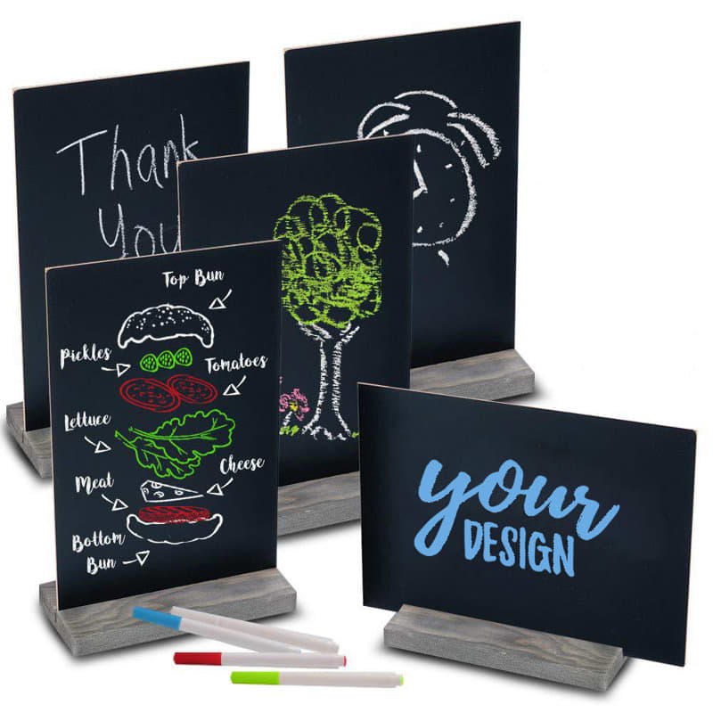 A set of tabletop chalkboard signs with wood bases in black, featuring various colourful chalk designs and markers. Tabletop Chalkboard Signs With Wood Base - Image 1