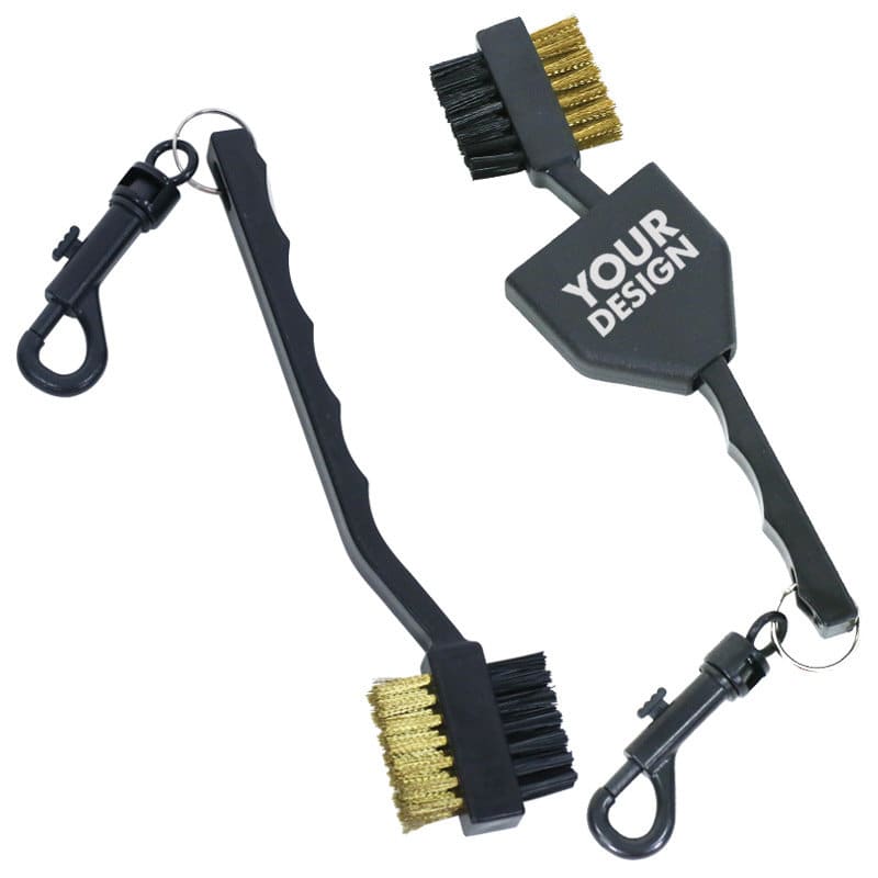 A golf club brush with dual heads, featuring black handles and gold bristles, includes a clip for attachment. Golf Club Brush With Dual Head - Image 1