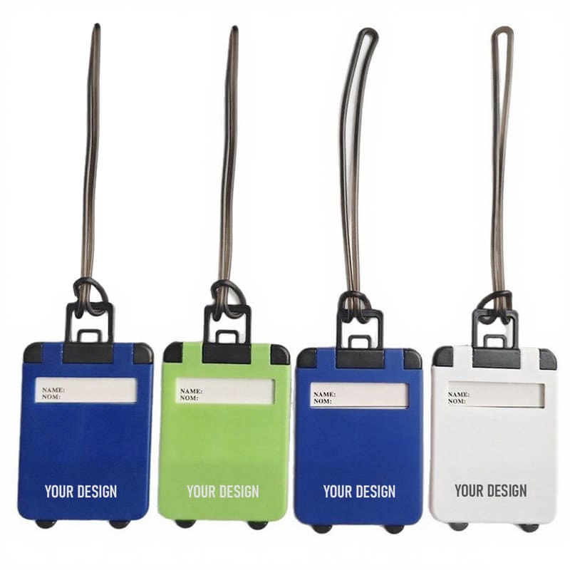 Mini suitcase luggage tags in blue, green, and white, with a hook and space for personal details. Each has a logo. Mini Suitcase Luggage Tag - Image 1