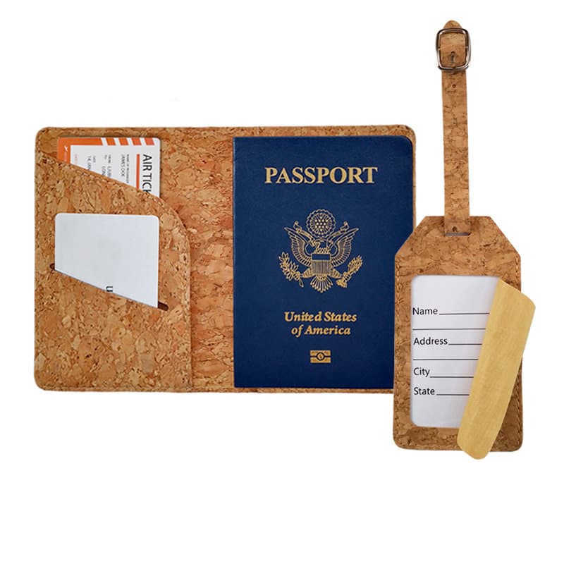 A cork passport holder with compartments for a passport and cards, paired with a matching cork luggage tag. Cork Passport Holder And Luggage Tag Set - Image 1